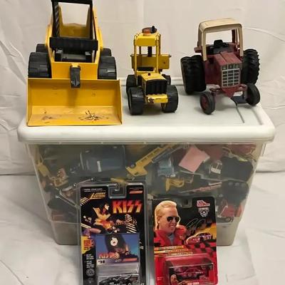 Vintage Toy Vehicle Collection with Metal and Plastic Construction Pieces