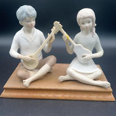 AZ939J Boy And Girl Playing Musical Instruments