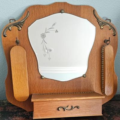 Antique hanging vanity mirror with brushes