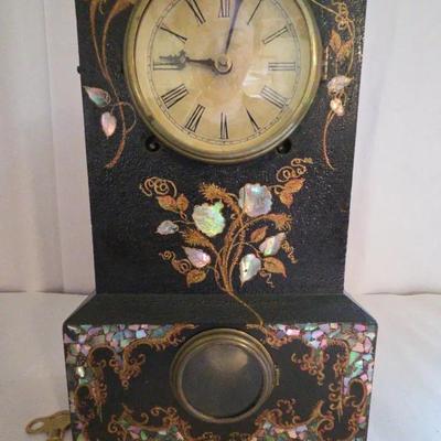 Antique Iron Clock with Mother-of-Pearl Inlay

