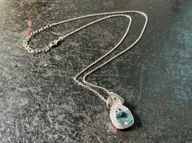 Platinum Plated necklace with Topaz Pendant