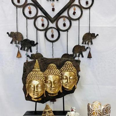 Golden Buddha and Rustic Metal Decor Collection A Striking Ensemble of Spiritual and Rustic Art