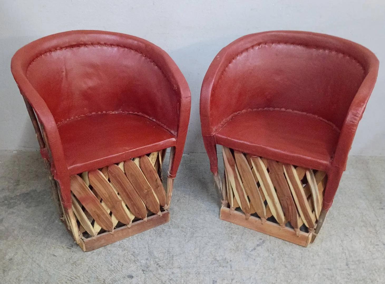Two Red Equipale Chairs and Table