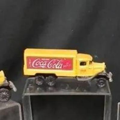 (3) Cast Iron Vintage Coca Cola Trucks