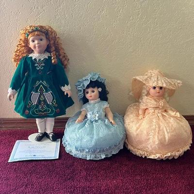 Three Dolls