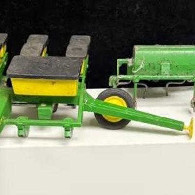 John Deere 1700 planter, which is a type of agricultural equipment used for planting seeds