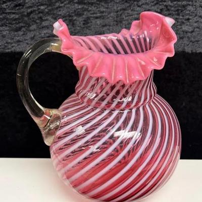 Fenton Cranberry Opalescent Swirl pitcher.