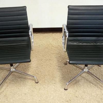 1243	EAMES ALUMINUM CHAIRS, EACH APPROXIMATELY 23 IN X 21 IN X 33 IN H
