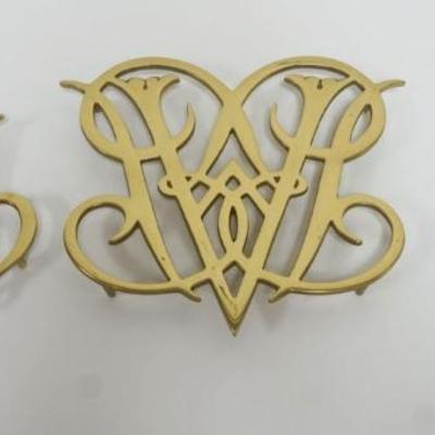 1014	COLONIAL WILLIAMSBURG VINTAGE BRASS TRIVETS, LARGEST APPROXIMATELY 9 IN X 10 1/2 IN
