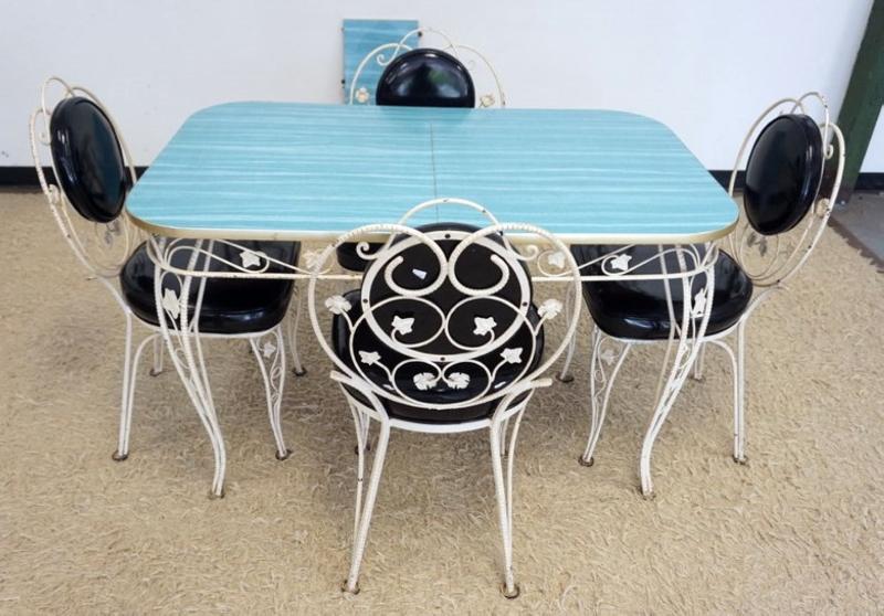 Sale Photo Thumbnail #257: 1256	VINTAGE WROUGHT IRON FORMICA TOP DINETTE SET, TABLE WITH LEAVE AND 4 CHAIRS, TABLE APPROXIMATELY 48 IN X 30 IN X 30 IN H, LEAF 12 IN
