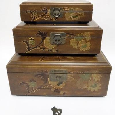 1157	NEST OF 3 ASIAN STYLE LAQUERED BOXES, LARGEST APPROXIMATELY 18 IN X 11 IN X 8 IN H
