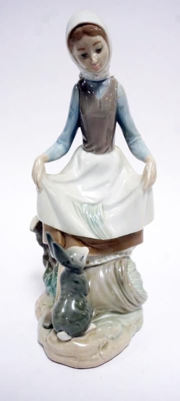 Sale Photo Thumbnail #60: 1060	LLADRO PORCELAIN FIGURE *RABBITS FOOD* #4826, APPROXIMATELY 9 1/2 IN HIGH
