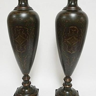1145	PAIR OF CASTILIAN IMPORTS DECORATIVE COMPOSITE URNS, EACH APPROXIMATELY 26 IN H
