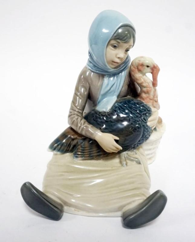 Sale Photo Thumbnail #66: 1066	LLADRO PORCELAIN FIGURE *GIRL WITH TURKEY* APPROXIMATELY 6 1/2 IN HIGH
