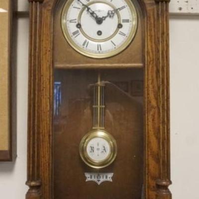 1192	HOWARD MILLER WALL CLOCK, APPROXIMATELY 31 IN H
