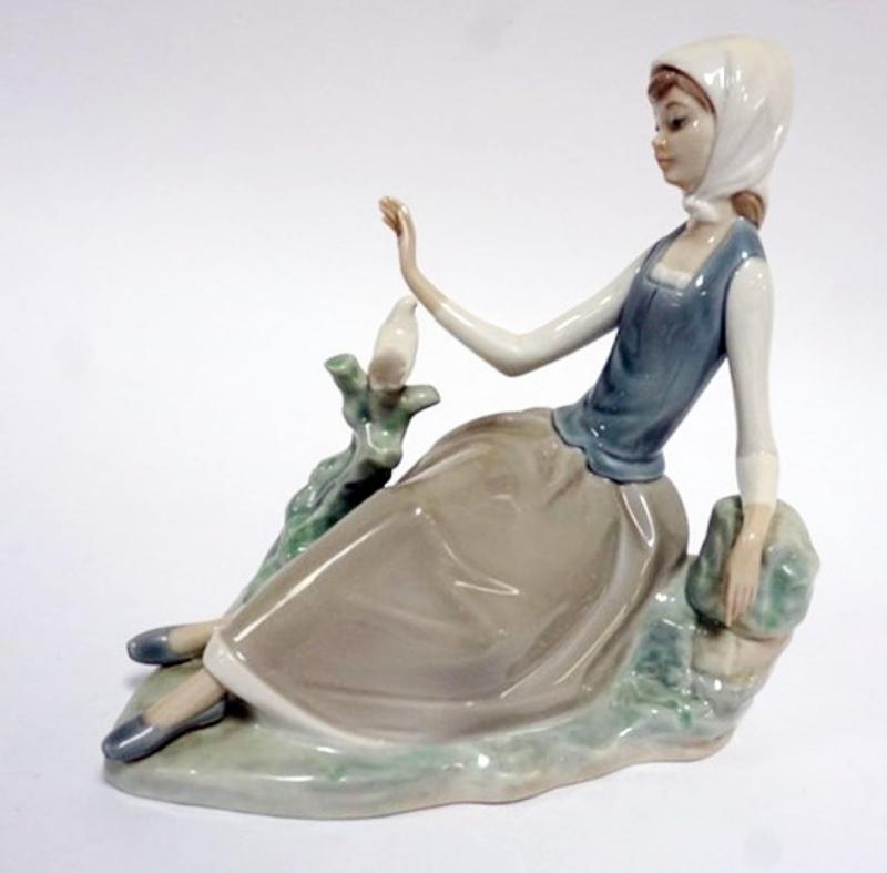 Sale Photo Thumbnail #57: 1057	LLADRO PORCELAIN FIGURE *SHEPHERDESS AND DOVE* #4660, APPROXIMATELY 7 IN HIGH
