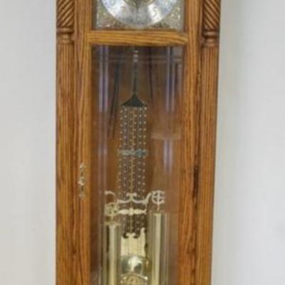 1196	OAK HOWARD MILLER GRANDFATHERS CLOCK *GLOCKENSPEIL* MODEL 610-766, APPROXIMATELY 24 IN X 14 IN X 87 N H
