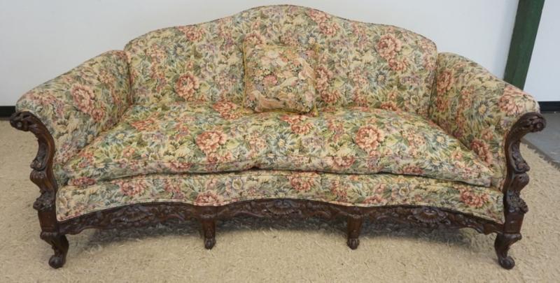 Sale Photo Thumbnail #256: 1255	FLORAL UPHOLSTERED TUFTED BACK SOFA WITH HEAVILY CARVED FRAME, APPROXIMATELY 78 IN X 39 IN X 38 IN H
