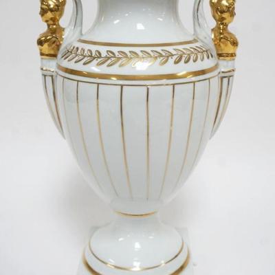 1040	PORCELAIN URN W/GILT ACCENTS & FEMALE FIGURAL BUSTS ON EITHER SIDE, APPROXIMATELY 13 IN HIGH
