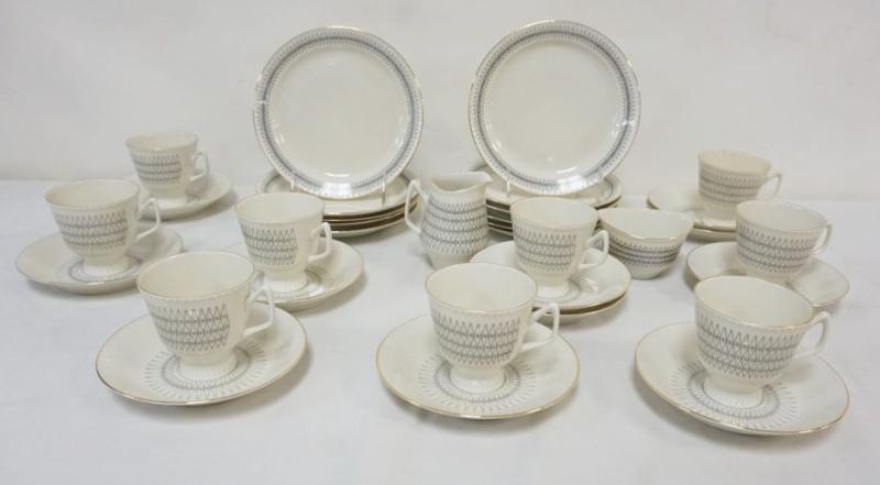 Sale Photo Thumbnail #33: 1033	PORSGRUND NORWAY CHINA 33 PIECES INCLUDING 11-6 3/4 IN PLATES, 9 CUPS, 11 SAUCEERS, CREAMER, PLUS
