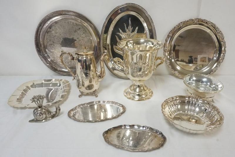 Sale Photo Thumbnail #99: 1099	LARGE GROUP OF ASSORTED SILVER PLATE ITEMS INCLUDING SERVING TRAYS, WINE COOLER, ETC., LARGEST PIECE APPROXIMATELY 10 1/2 IN H
