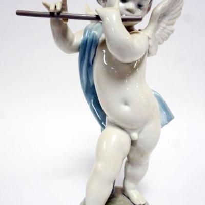 1065	LLADRO PORCELAIN FIGURE *ANGEL WITH FLUTE* APPROXIMATELY 11 IN HIGH
