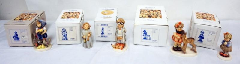 Sale Photo Thumbnail #81: 1081	GOBEL HUMMEL FIGURINES, GROUP OF 5 W/BOXES, TALLEST APPROXIMATELY 5 1/2 IN
