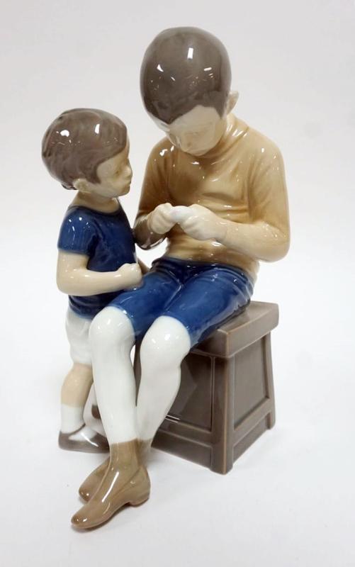Sale Photo Thumbnail #52: 1052	ROYAL COPENHAGEN FIGURE OF 2 YOUNG BOYS *TOM & WILLY* #1643, APPROXIMATELY 8 IN HIGH
