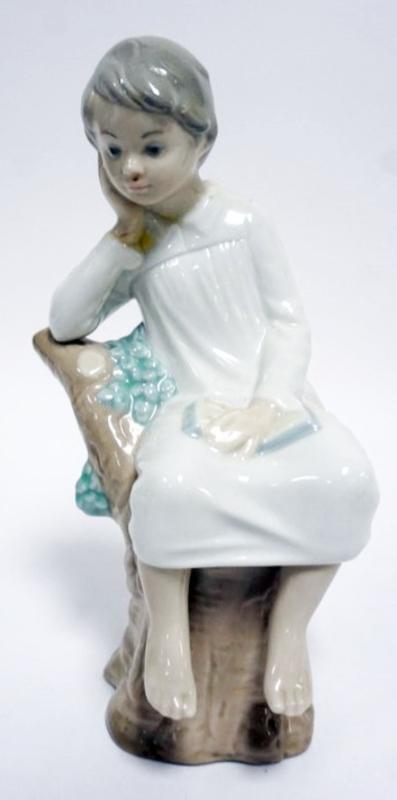 Sale Photo Thumbnail #61: 1061	LLADRO PORCELAIN FIGURE *THE LITTLE BOY THINKING* APPROXIMATELY 8 1/2 IN
