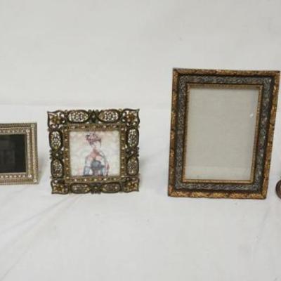 1164A	GROUP OF 5 DECORATIVE DRESSER TOP PHOTO FRAMES, 3 ARE JEWELED, LARGEST APPROXIMATELY 11 1/4 IN X 7 IN
