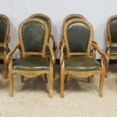 1228	SET OF 8 OAK SCROLLED ARM CHAIRS WITH GREEN LEATHER BOTTOMS AND BACKS, BRASS TACK ACCENTS, APPROXIMATELY 23 3/4 IN X 21 IN X 40 1/2 IN
