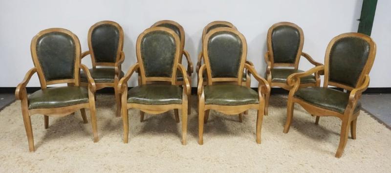 Sale Photo Thumbnail #229: 1228	SET OF 8 OAK SCROLLED ARM CHAIRS WITH GREEN LEATHER BOTTOMS AND BACKS, BRASS TACK ACCENTS, APPROXIMATELY 23 3/4 IN X 21 IN X 40 1/2 IN
