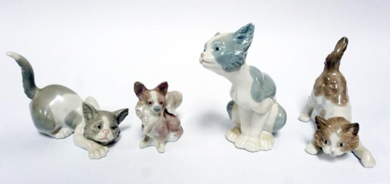 Sale Photo Thumbnail #74: 1074	LLADRO PORCELAIN FIGURES GROUP OF 4 FIGURES, 3 CATS, ONE DOG, LARGEST APPROXIMATELY 5 1/2 IN HIGH
