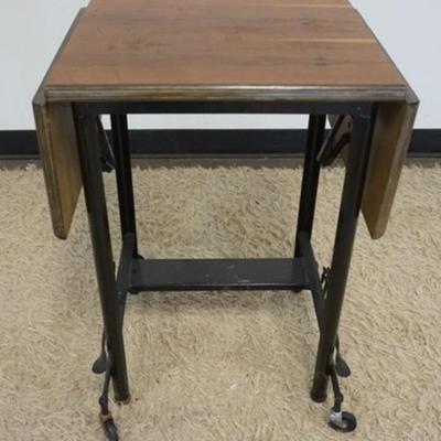 1246	HI-LO TYPEWRITER STAND, INDUSTRIAL STYLE METAL ROLLING TABLE WITH WOOD TOP AND FOLDING SIDES, APPROXIMATELY 20 IN X 16 IN X 27 IN,...