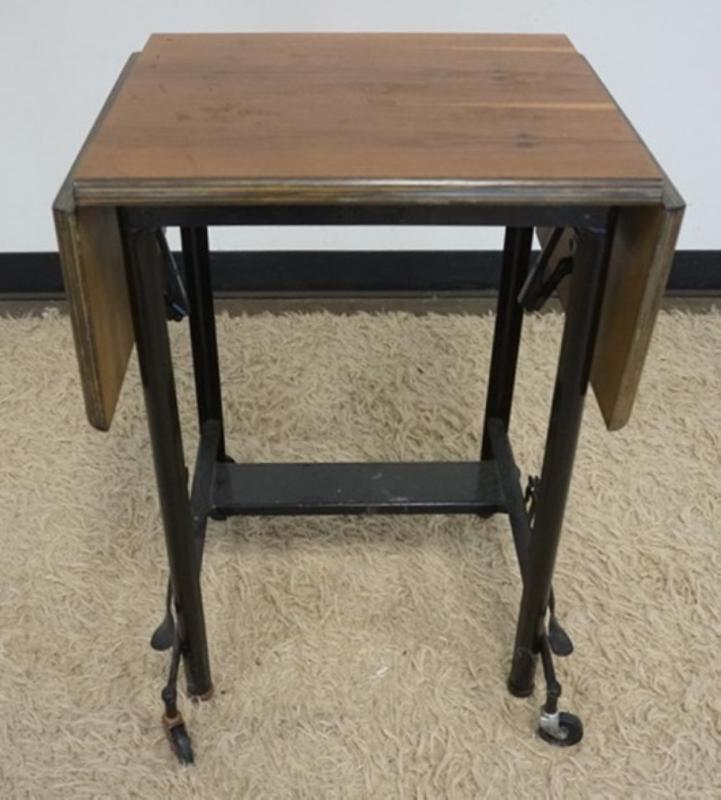 Sale Photo Thumbnail #247: 1246	HI-LO TYPEWRITER STAND, INDUSTRIAL STYLE METAL ROLLING TABLE WITH WOOD TOP AND FOLDING SIDES, APPROXIMATELY 20 IN X 16 IN X 27 IN, EACH DROP 9 IN
