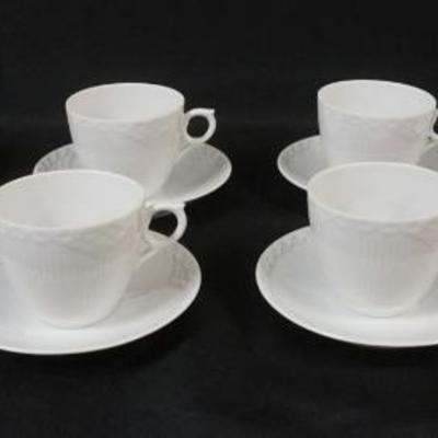 1025	ROYAL COPENHAGEN WHITE HALF LACE 8 TEACUPS & SAUCERS, APPROXIMATELY 3 IN HIGH
