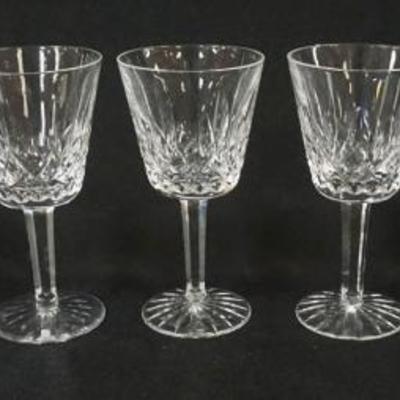 1003	WATERFORD CRYSTAL 7 WINES, EACH APPROXIMATELY 6 IN HIGH
