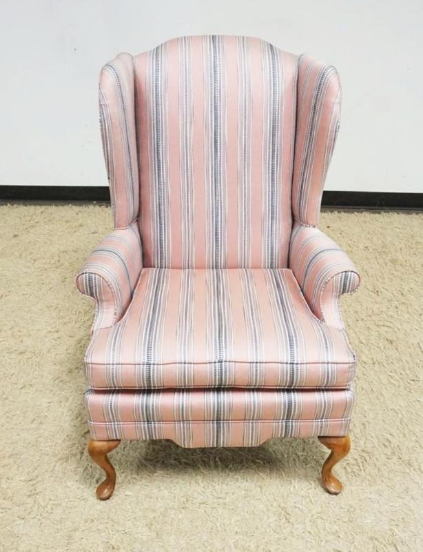 Sale Photo Thumbnail #284: 1283	UPHOLSTERED WING BACK CHAIR, APPROXIMATELY 27 IN X 28 IN X 43 IN H
