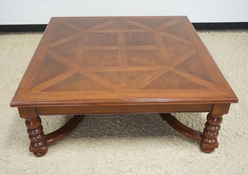Sale Photo Thumbnail #268: 1267	MAHOGANY COCKTAIL TABLE W/TURNED LEGS & BURLWOOD & LATTICE PATTERN TOP, APPROXIMATELY 48 IN X 19 IN HIGH
