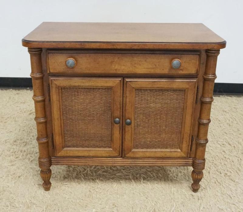 Sale Photo Thumbnail #234: 1233	LANE 1 DRAWER, 2 DOOR FRUITWOOD STAND WITH WOVEN PANELED DOORS, FAUX BAMBOO TURN COLUMN SIDES, APPROXIMATELY 32 IN X 17 IN X 30 IN H
