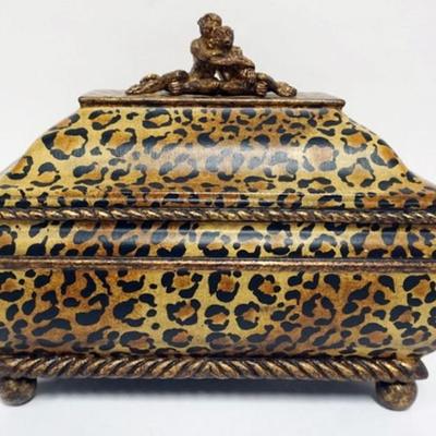 1151	CASTILIAN IMPORTS FAUX LEOPARD SKIN BOX WITH MONKEYS ON LID TOP, APROXIMATELY 13 IN X 7 IN X 11 IN
