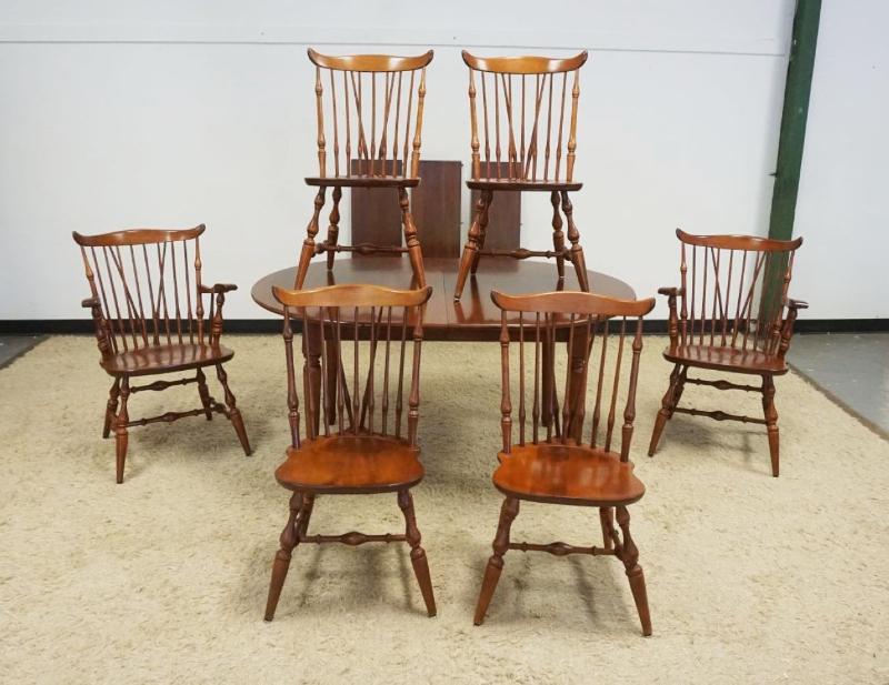 Sale Photo Thumbnail #270: 1269	HENKEL HARRIS SOLID BLACK CHERRY TABLE WITH 3 LEAVES AND 6 WINDSOR CHAIRS - NICHOLAS AND STONE, TABLE APPROXIMATELY 60 IN X 44 IN X 30 IN H, LEAVES EACH APPROXIMATELY 12 IN
