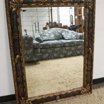 1123	FRAMED BEVELED EDGE MIRROR, FRAME PAINT DECORATED WITH CARVED IMAGES, GRAPES, LEAVES AND BIRDS, APPROXIMATELY 37 N X 49 IN
