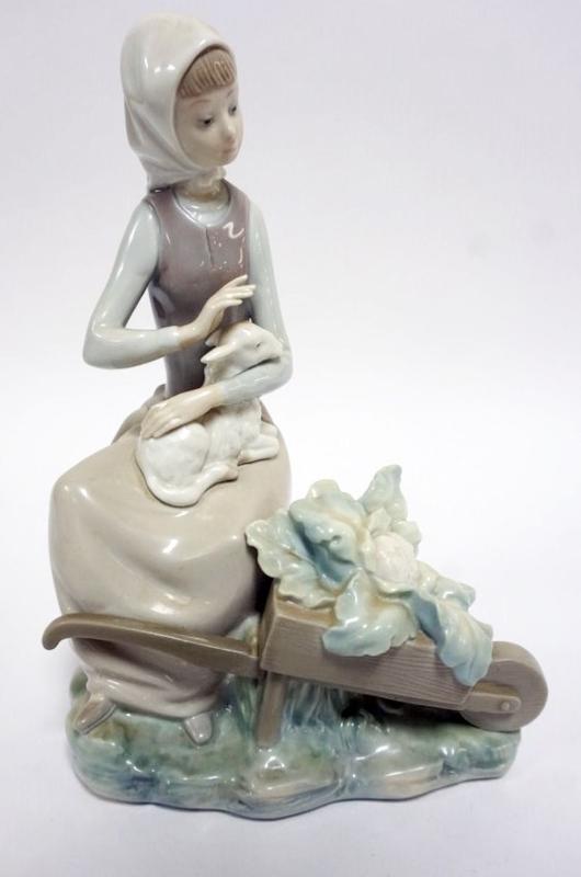 Sale Photo Thumbnail #64: 1064	LLADRO PORCELAIN FIGURE *GIRL WITH WHEELBARROW AND LAMB* APPROXIMATELY 9 1/2 IN
