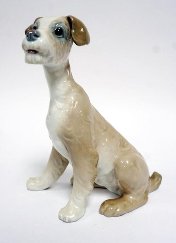 Sale Photo Thumbnail #56: 1056	LLADRO PORCELAIN FIGURE DOG *TRAMP* APPROXIMATELY 8 IN HIGH
