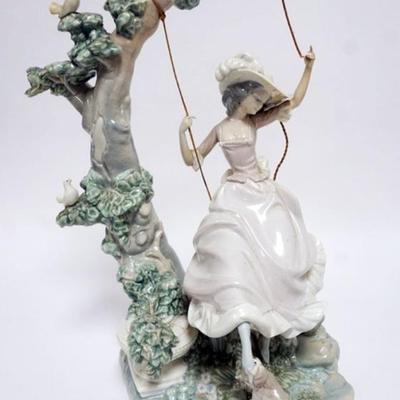 1075	LLADRO PORCELAIN FIGURE *VICTORIAN GIRL ON SWING* ROPE SEPARATED ON RIGHT SIDE, APPROXIMATELY 17 IN HIGH
