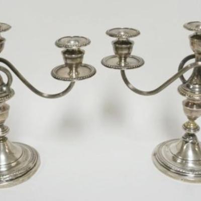 1095	PAIR OF STERLING SILVER WEIGHTED CANDELABRA, EACH APPROXIMATELY 10 IN H
