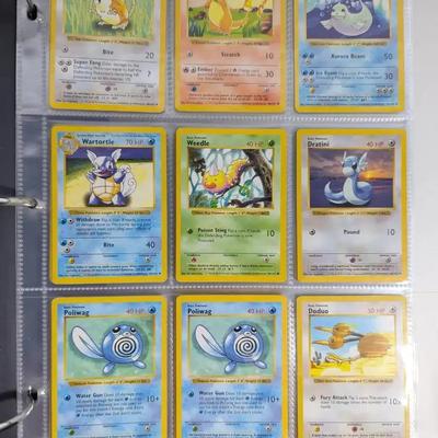 Binder of Pokémon Cards from 1999