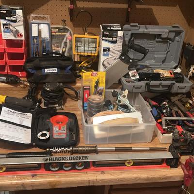 Workshop Hand Tool Collection Featuring Dremel, Black & Decker, and Bench Vise