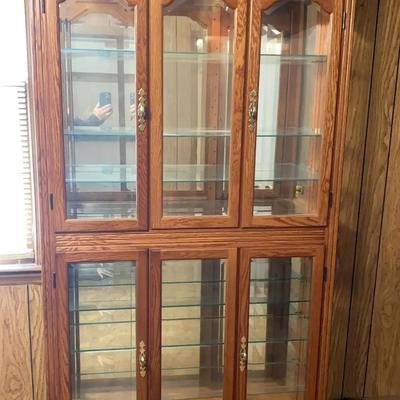 Light Wood China Cabinet with Beveled Glass Doors and Lighting